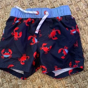 Baby Gap swim trunks, 6-12M